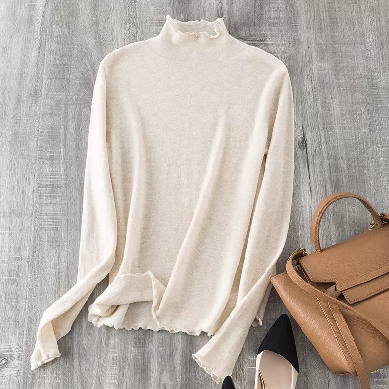 A must-have for everyone, perfect for pairing with statement pieces~ Nude-effect, ultra-comfortable extra-fine wool turtleneck knit top with a mock-neck collar