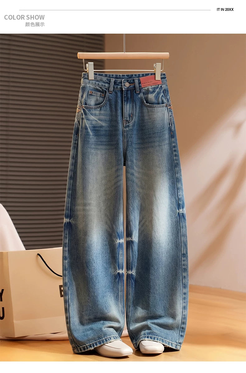Korean version of the design sense embroidered scimitar jeans women's 2026 autumn new loose meat covering and thin versatile wide-leg pants