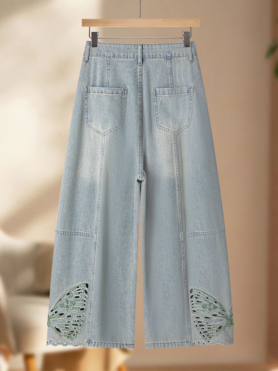 Design sense hollow embroidered jeans women's thin 2026 summer small loose hip covering thin scimitar nine-point pants