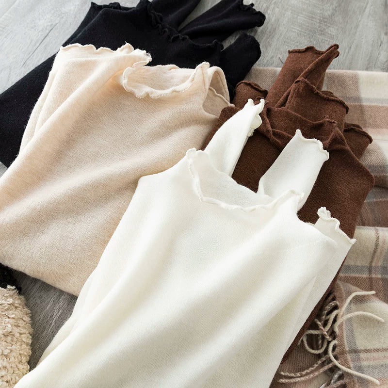 A must-have for everyone, perfect for pairing with statement pieces~ Nude-effect, ultra-comfortable extra-fine wool turtleneck knit top with a mock-neck collar