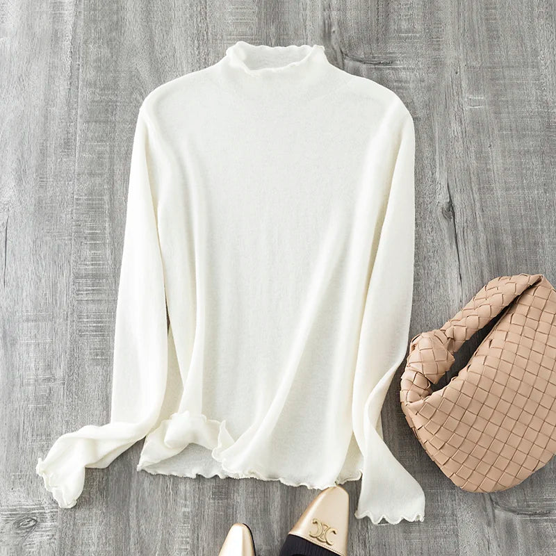 A must-have for everyone, perfect for pairing with statement pieces~ Nude-effect, ultra-comfortable extra-fine wool turtleneck knit top with a mock-neck collar