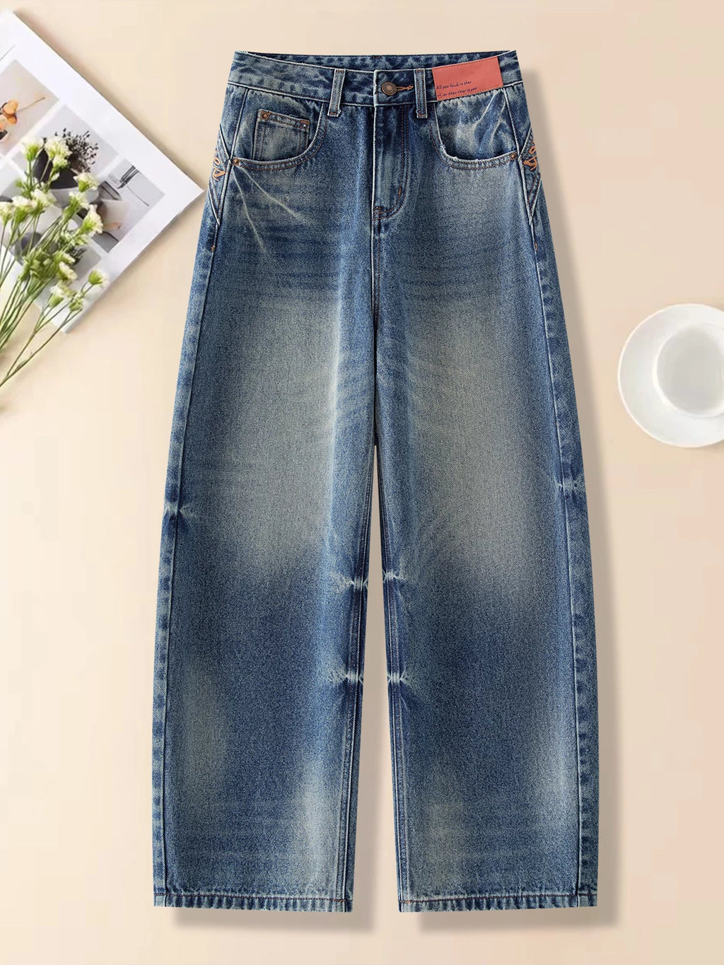 Korean version of the design sense embroidered scimitar jeans women's 2026 autumn new loose meat covering and thin versatile wide-leg pants